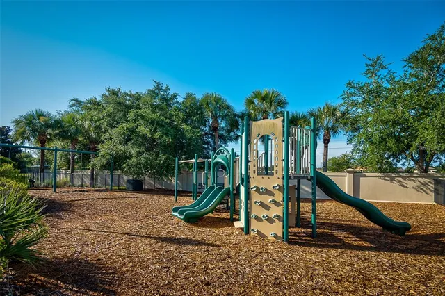 a view of a street with a building in the background