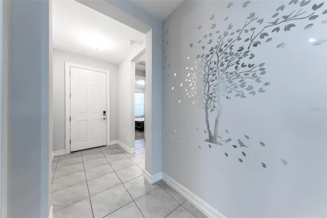 wooden floor with white walls