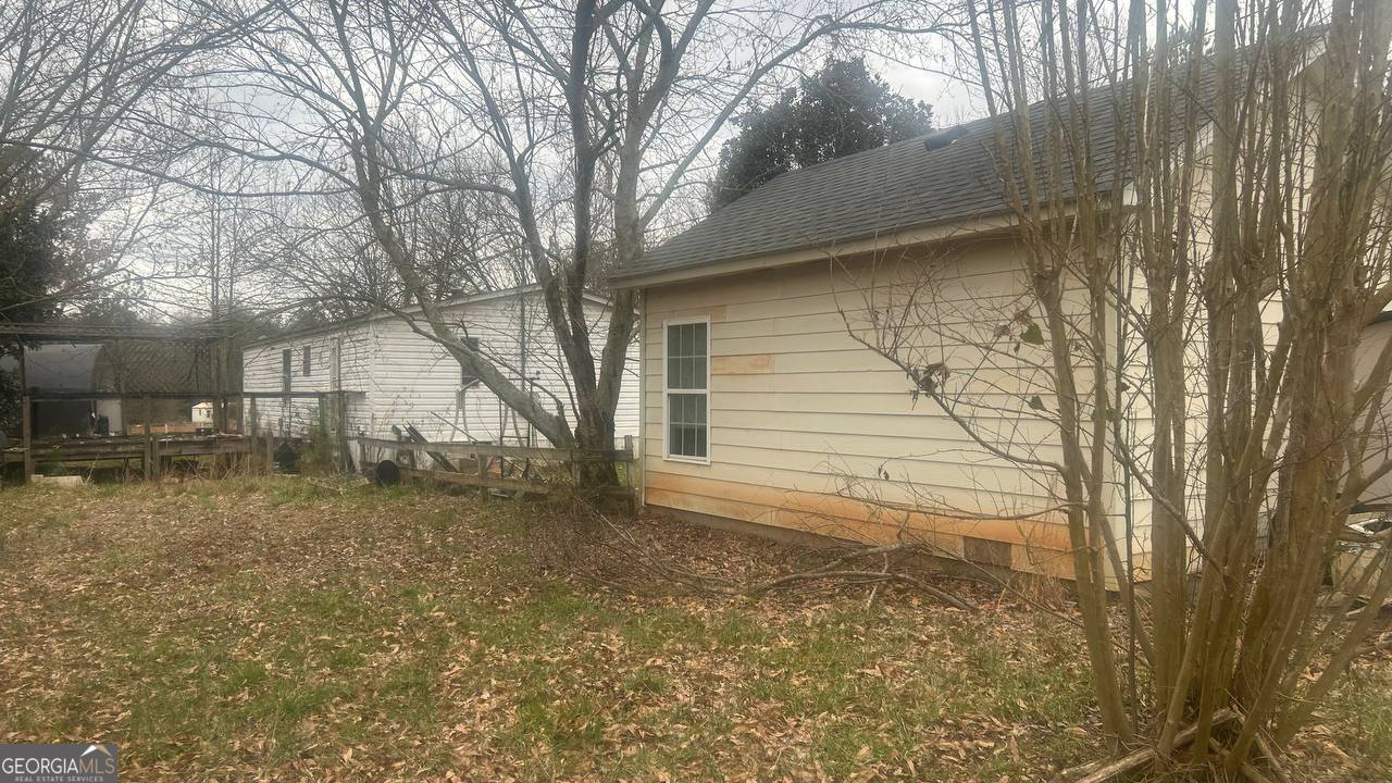19 Kathryn Way Commerce, GA 30530 - Photo 12 of 14 a view of a house with a yard