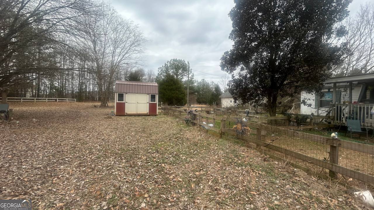 19 Kathryn Way Commerce, GA 30530 - Photo 2 of 14 a backyard of a house with lots of green space