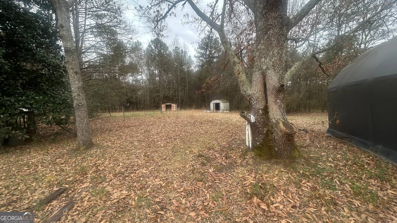 19 Kathryn Way Commerce, GA 30530 - Photo 4 of 14 a view of a backyard of the house