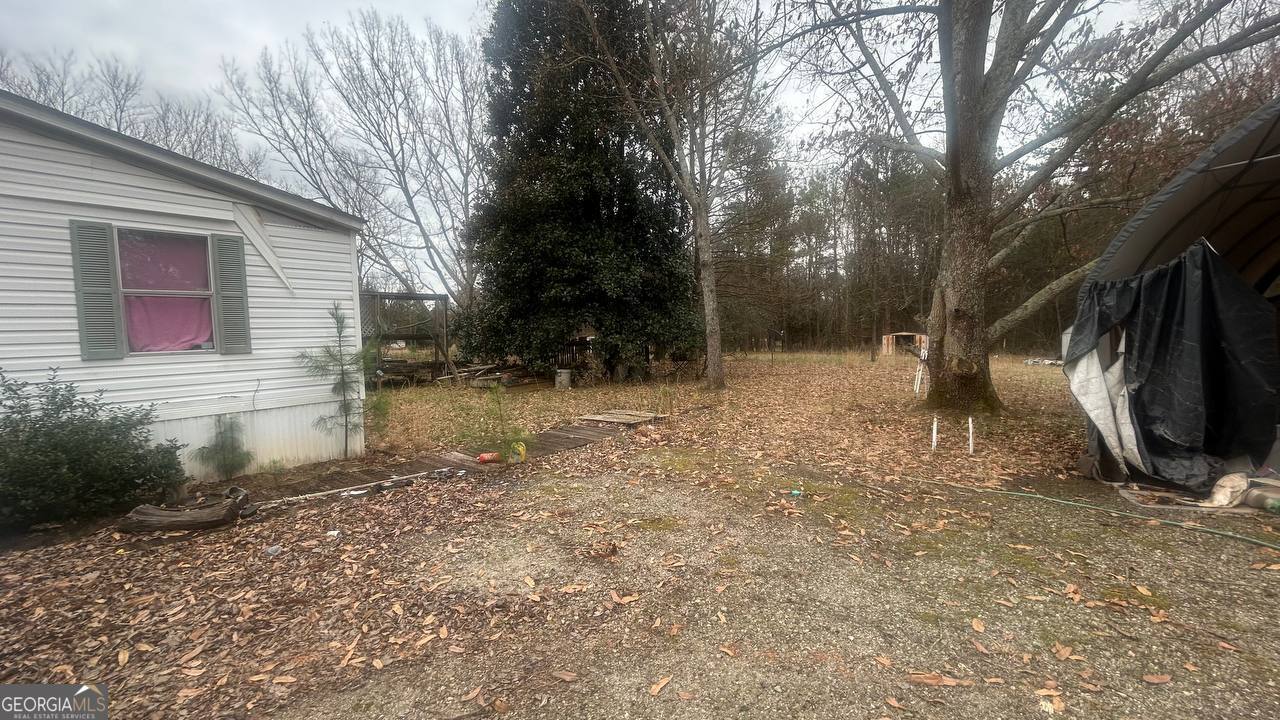 19 Kathryn Way Commerce, GA 30530 - Photo 6 of 14 a view of backyard with tree