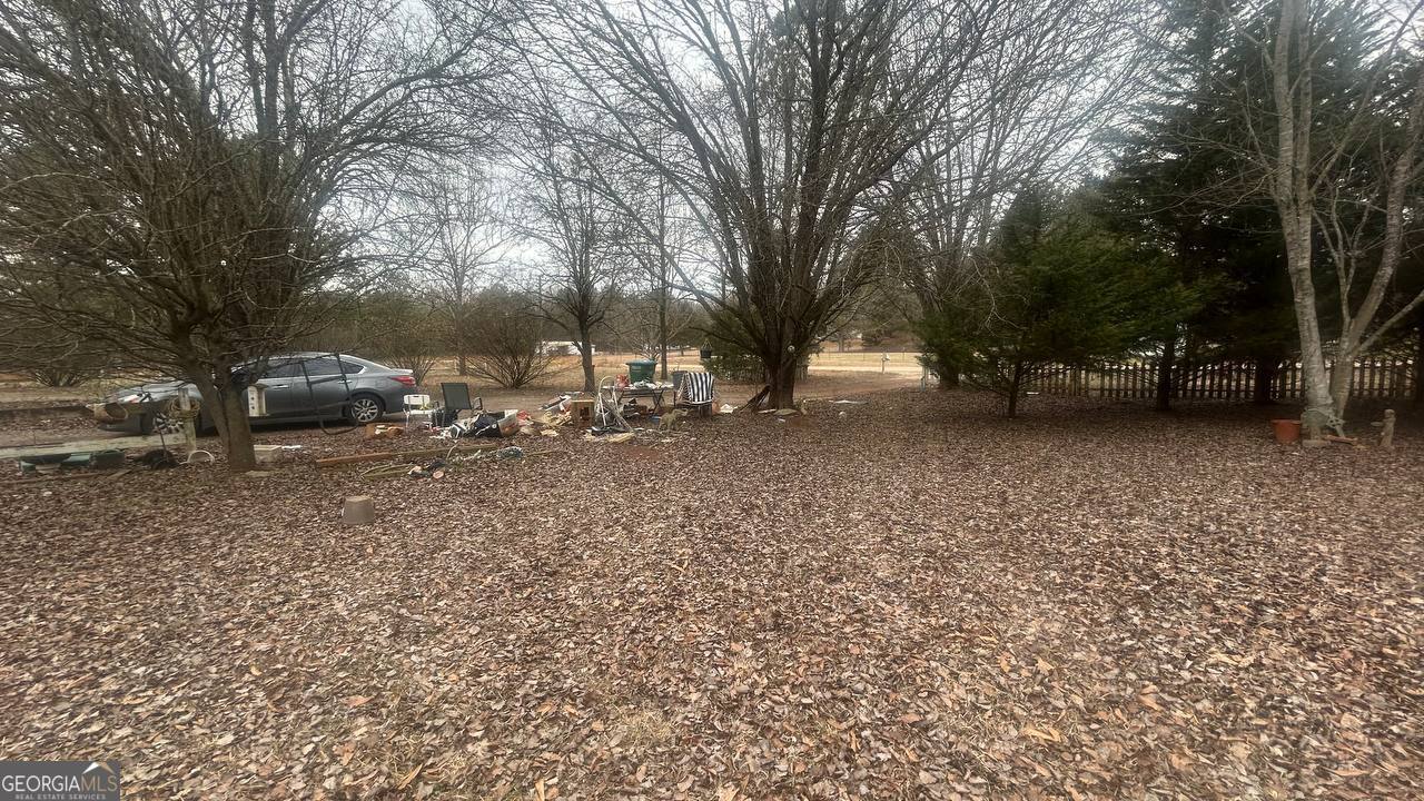 19 Kathryn Way Commerce, GA 30530 - Photo 7 of 14 a view of a yard with a tree