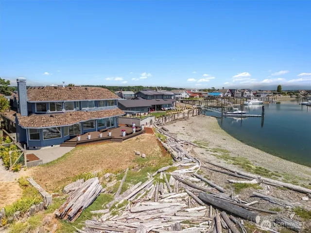a view of a swimming pool with an ocean view