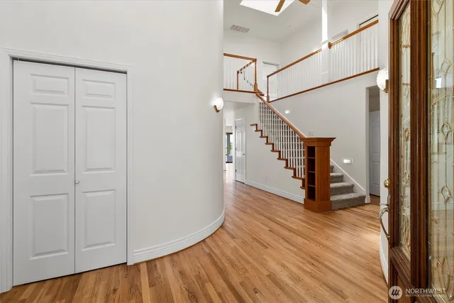 a view of entryway with wooden floor