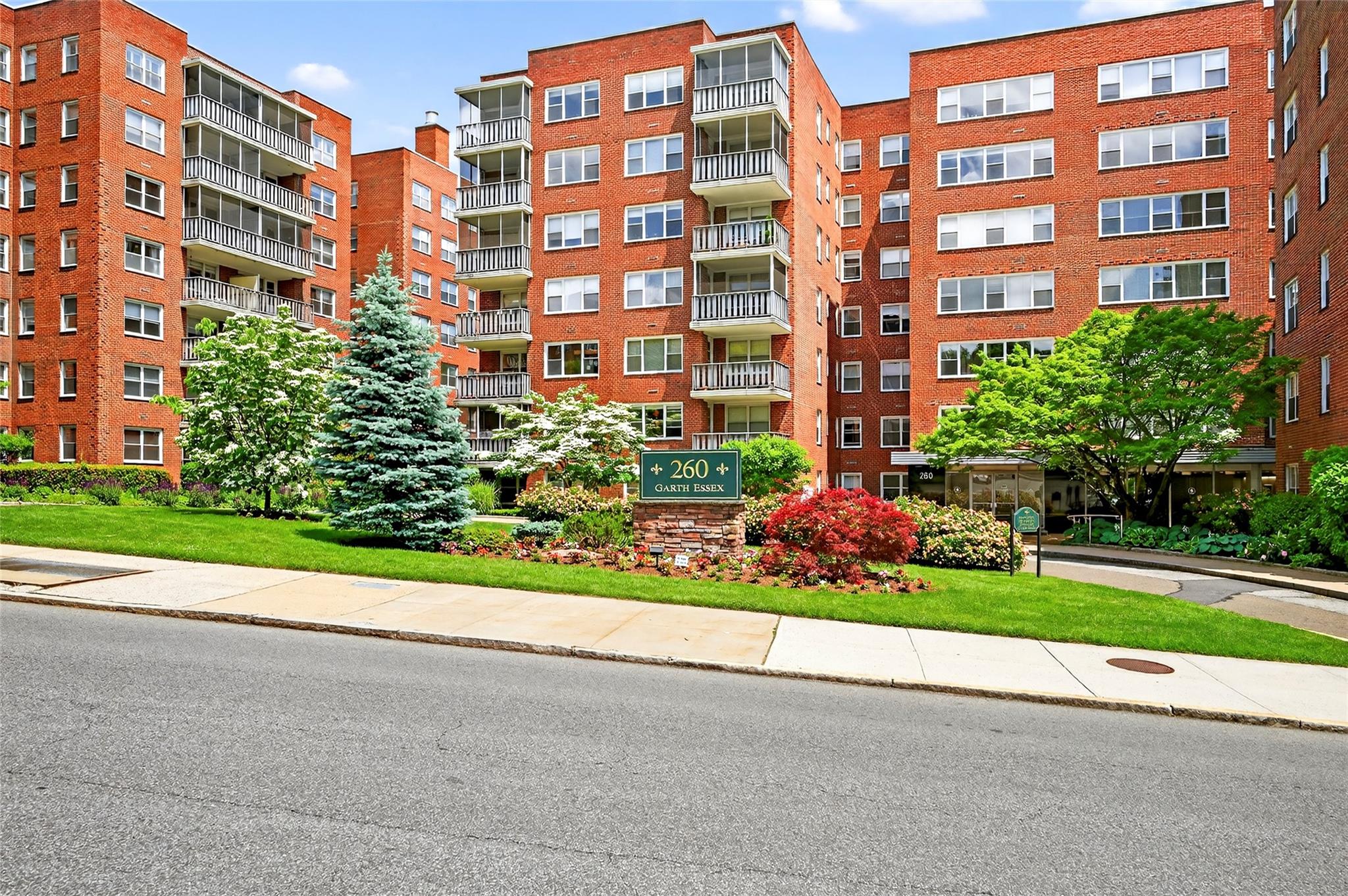 260 Garth Road, Unit 7G4 Scarsdale, NY 10583 - Photo 1 of 1 a view of a tall building from a window