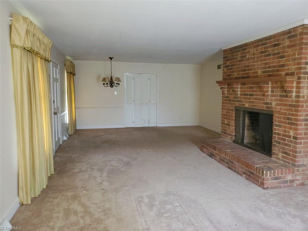 6412 Liberty Road Julian, NC 27283 - Photo 6 of 17 Giant Living Room Dining Room with Fireplace