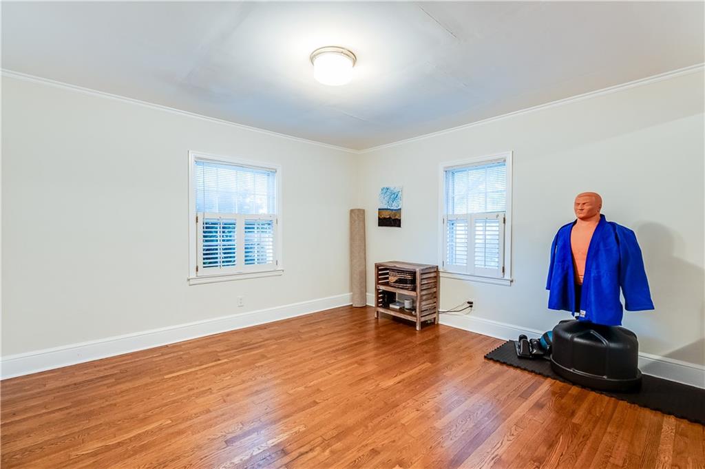 2083 West Rugby Avenue College Park, GA 30337 - Photo 14 of 49 a view of a room with furniture and clothes