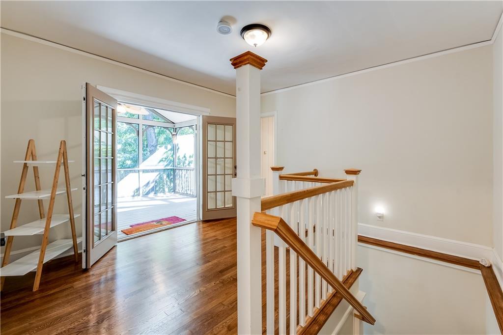2083 West Rugby Avenue College Park, GA 30337 - Photo 22 of 49 a view of a hallway with wooden floor and stairs