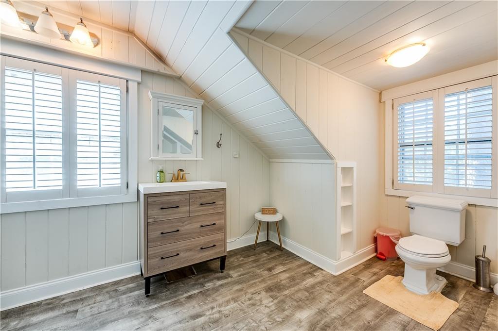 2083 West Rugby Avenue College Park, GA 30337 - Photo 34 of 49 a spacious bedroom with a bed and a window