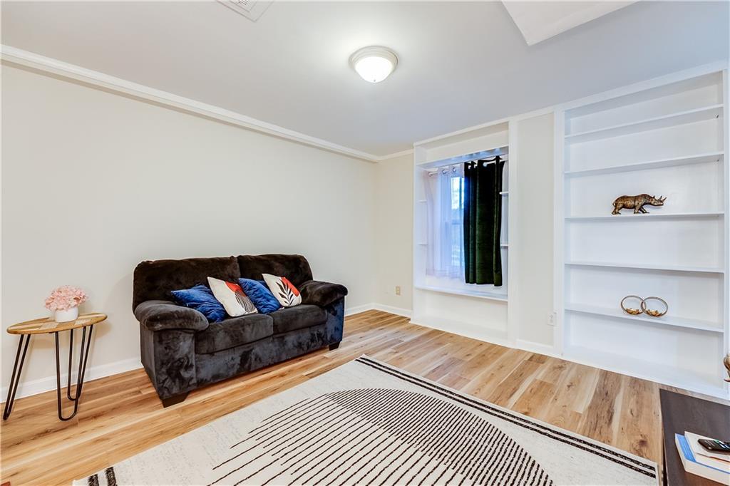 2083 West Rugby Avenue College Park, GA 30337 - Photo 41 of 49 a living room with furniture and a couch