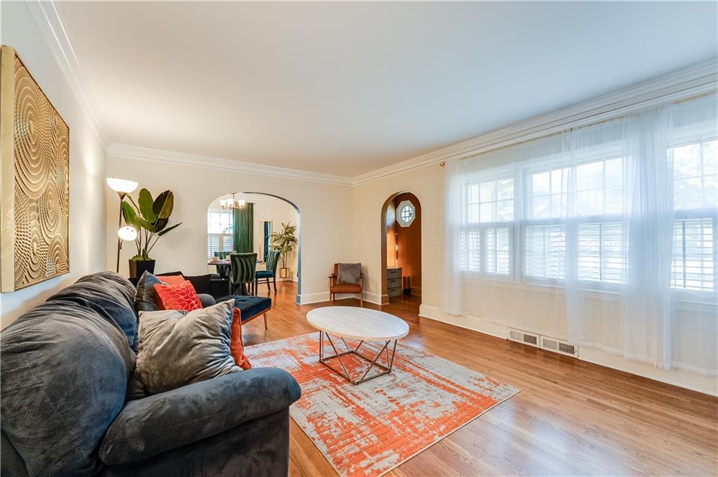2083 West Rugby Avenue College Park, GA 30337 - Photo 8 of 49 a living room with furniture and a large window
