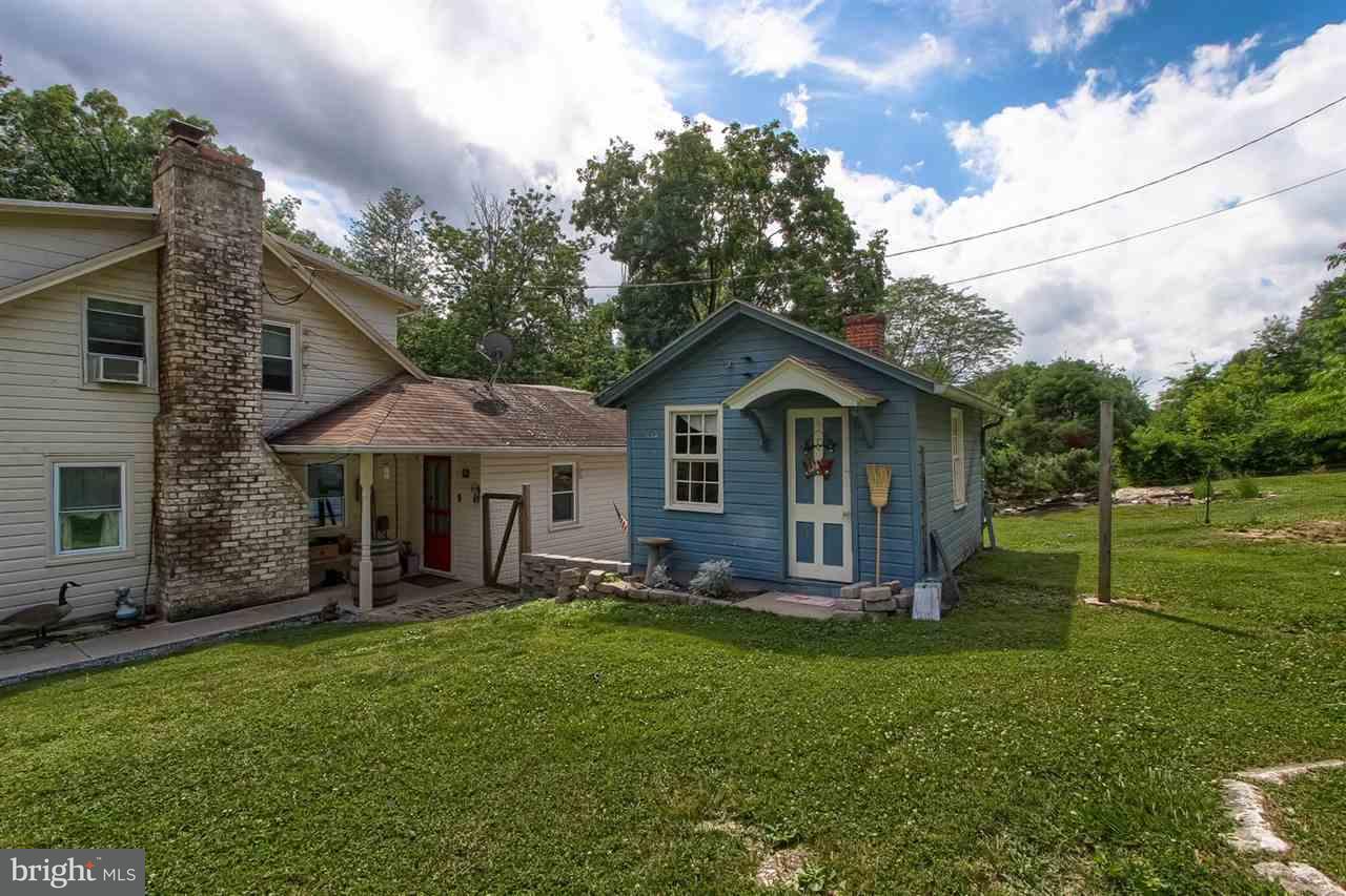 1745 Beck Mill Road Hanover, PA 17331 - Photo 2 of 25 a front view of a house with garden