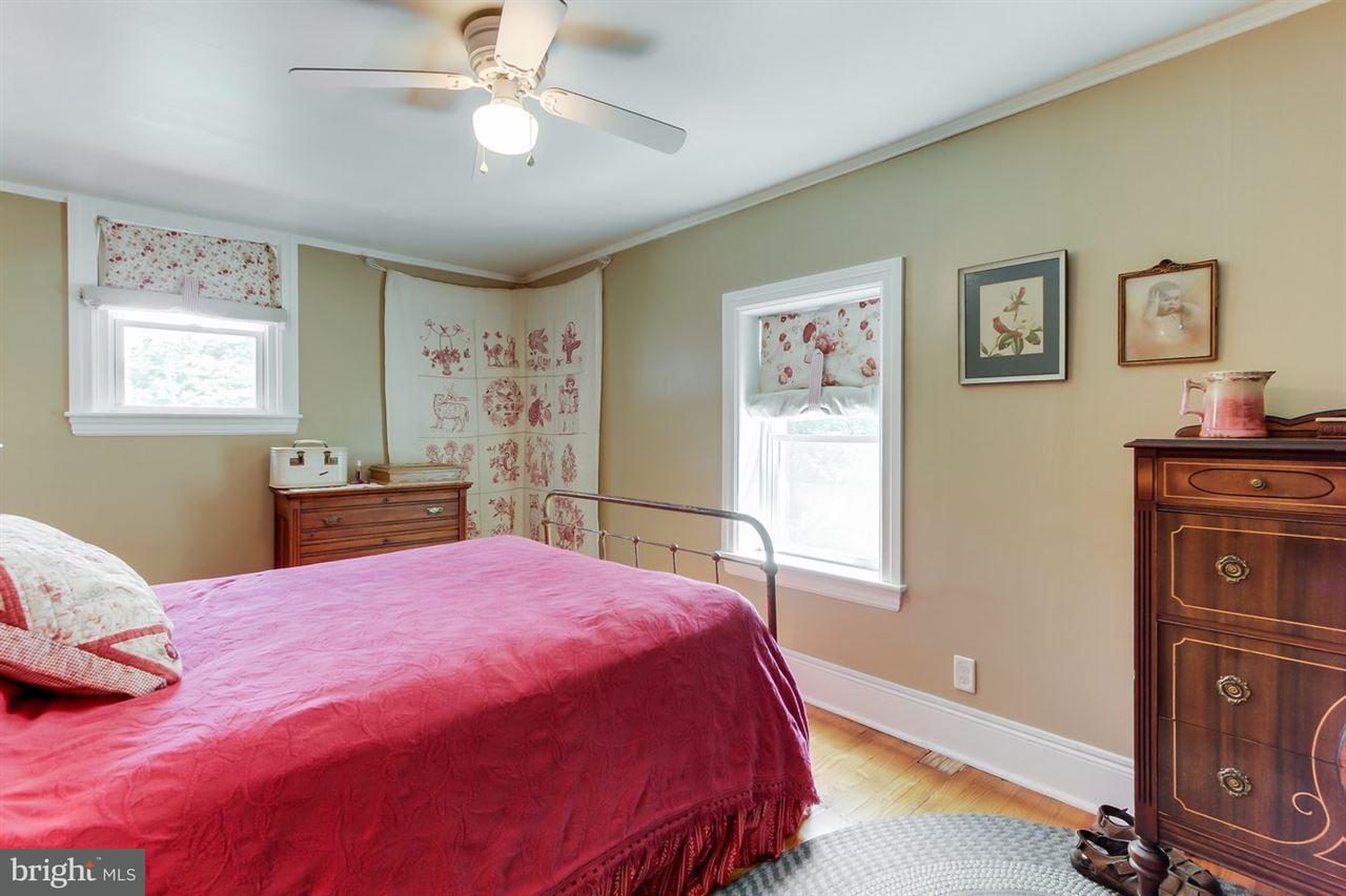 1745 Beck Mill Road Hanover, PA 17331 - Photo 15 of 25 a bedroom with a large bed and a window