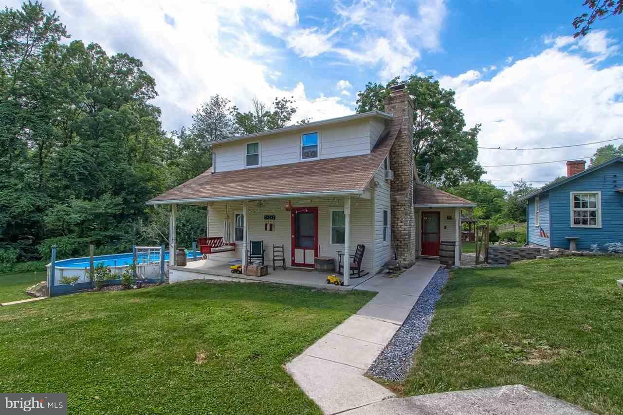 1745 Beck Mill Road Hanover, PA 17331 - Photo 17 of 25 a view of a house with a yard porch and sitting area