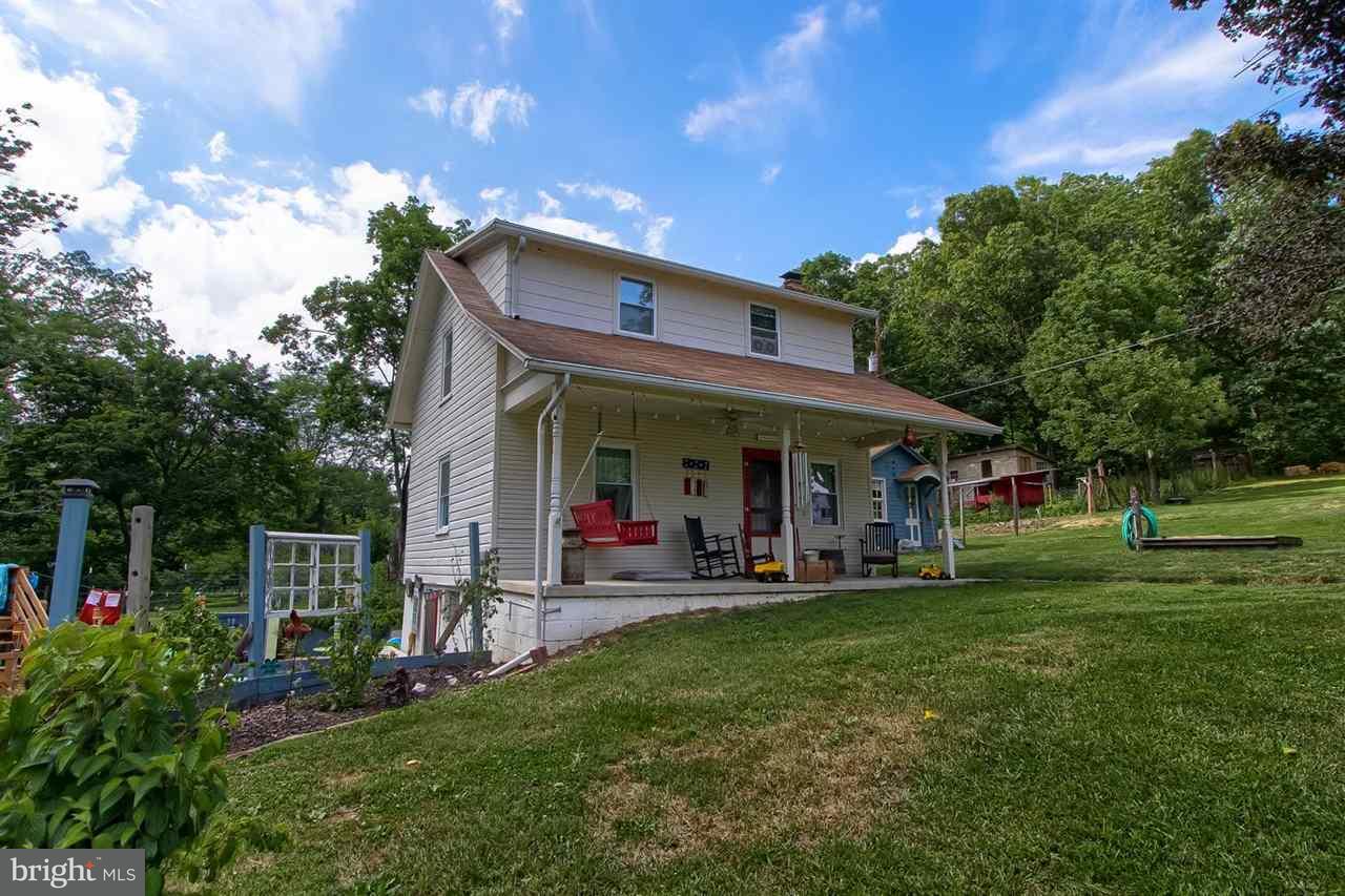 1745 Beck Mill Road Hanover, PA 17331 - Photo 18 of 25 a view of a house with a yard porch and sitting area