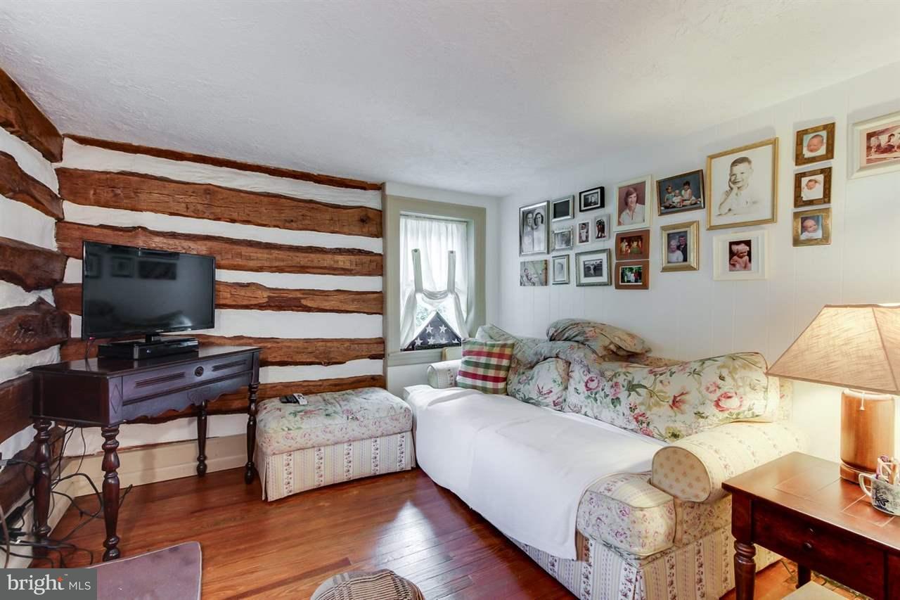 1745 Beck Mill Road Hanover, PA 17331 - Photo 5 of 25 a bedroom with a bed and a desk