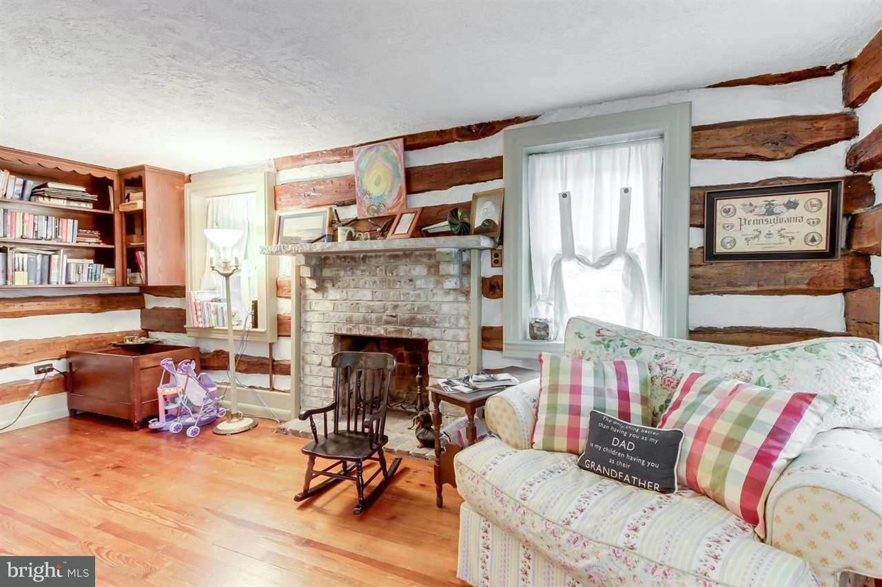 1745 Beck Mill Road Hanover, PA 17331 - Photo 7 of 25 a living room with furniture and a fireplace