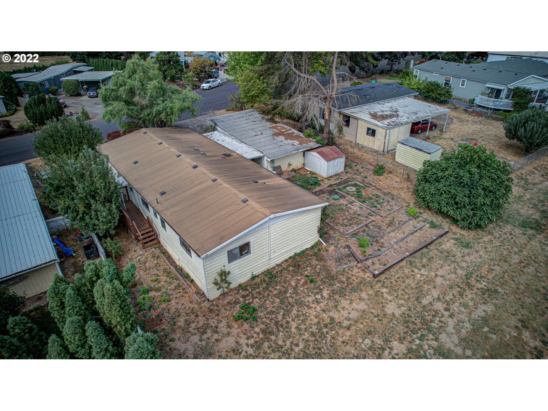 9290 Southwest Link Street Cornelius, OR 97113 - Photo 18 of 18 a aerial view of a house with a yard