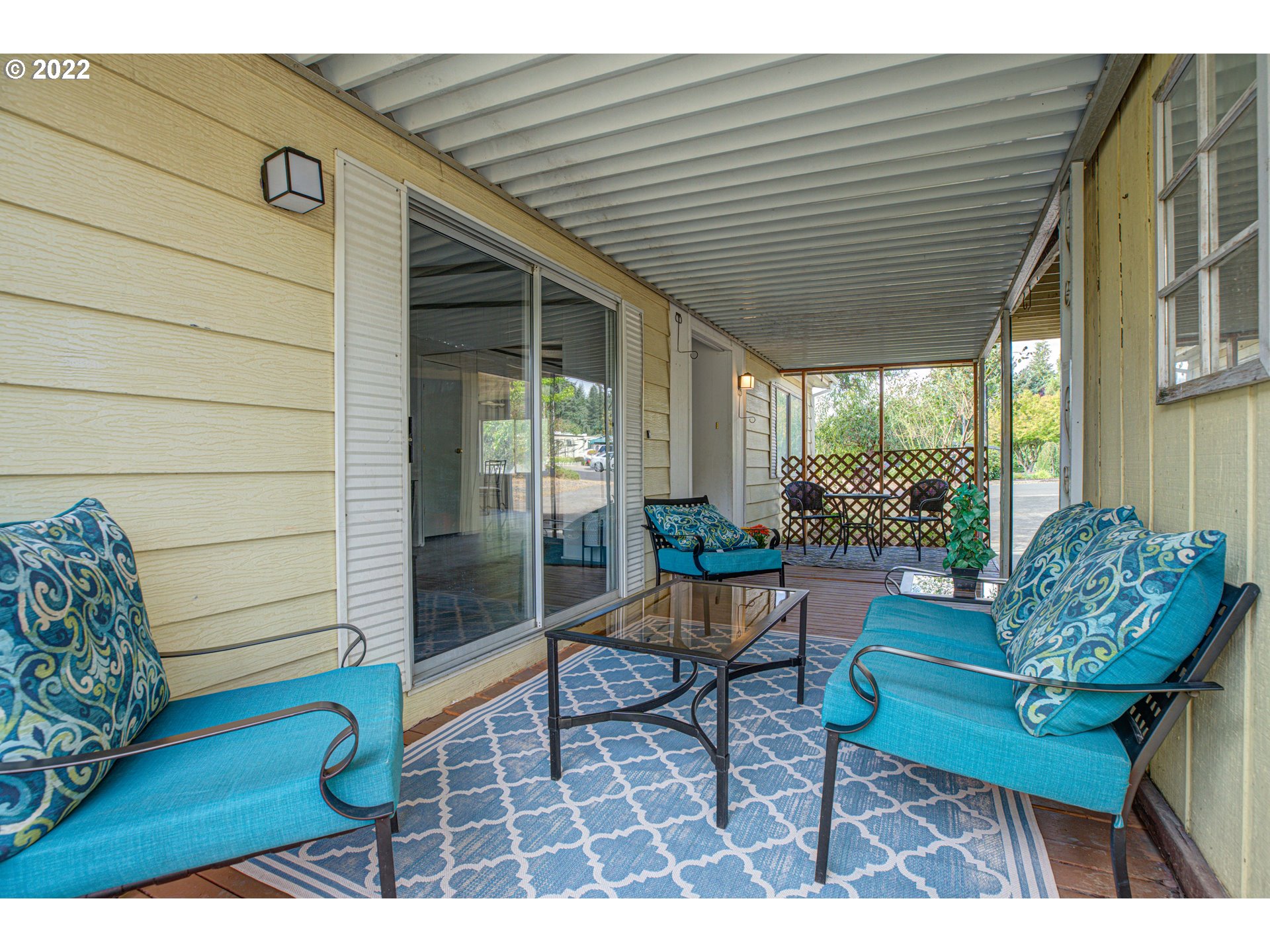 9290 Southwest Link Street Cornelius, OR 97113 - Photo 2 of 18 a outdoor living space with furniture and a potted plant