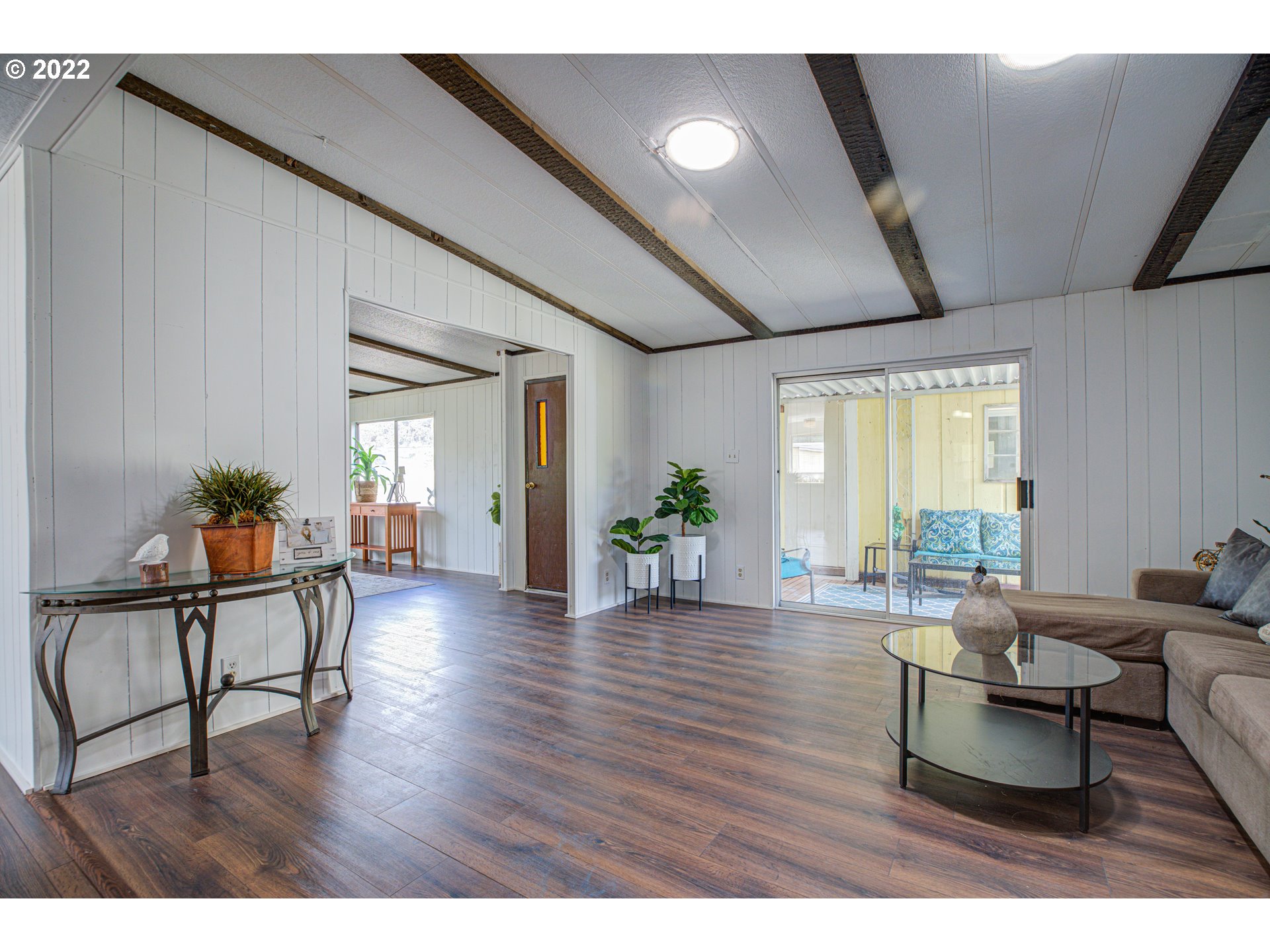9290 Southwest Link Street Cornelius, OR 97113 - Photo 8 of 18 a living room with furniture and wooden floor