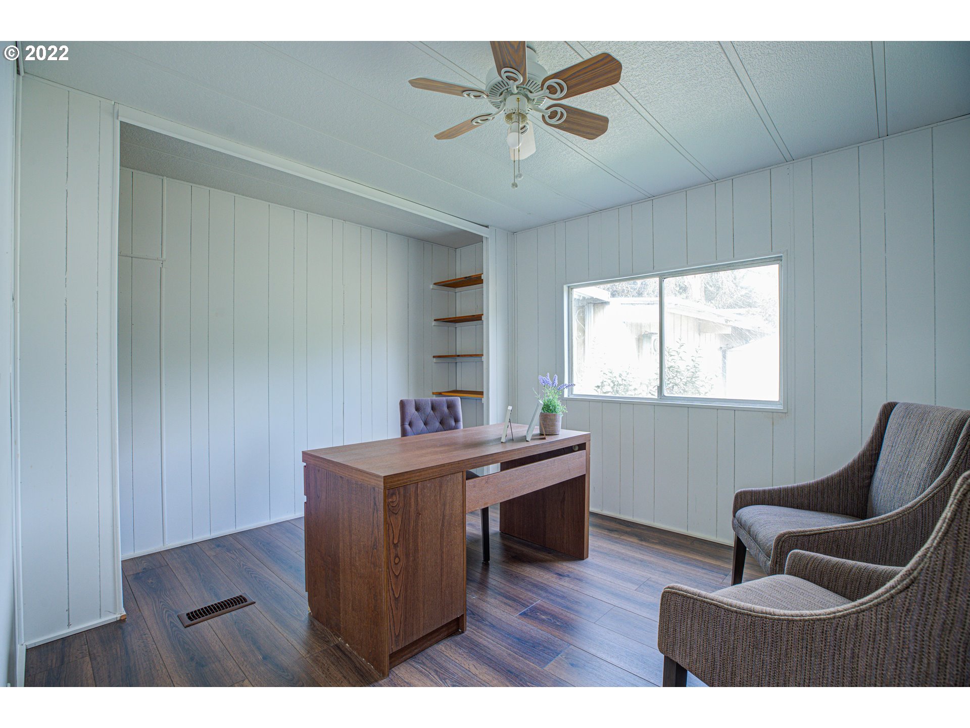 9290 Southwest Link Street Cornelius, OR 97113 - Photo 10 of 18 a view of a workspace with furniture and a window