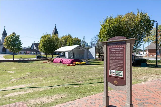 a childrens park with lots of swings and slides