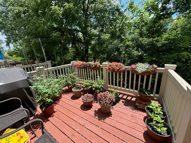 a view of a backyard with sitting area