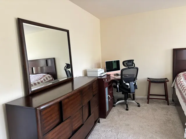 a view of workspace with wooden floor