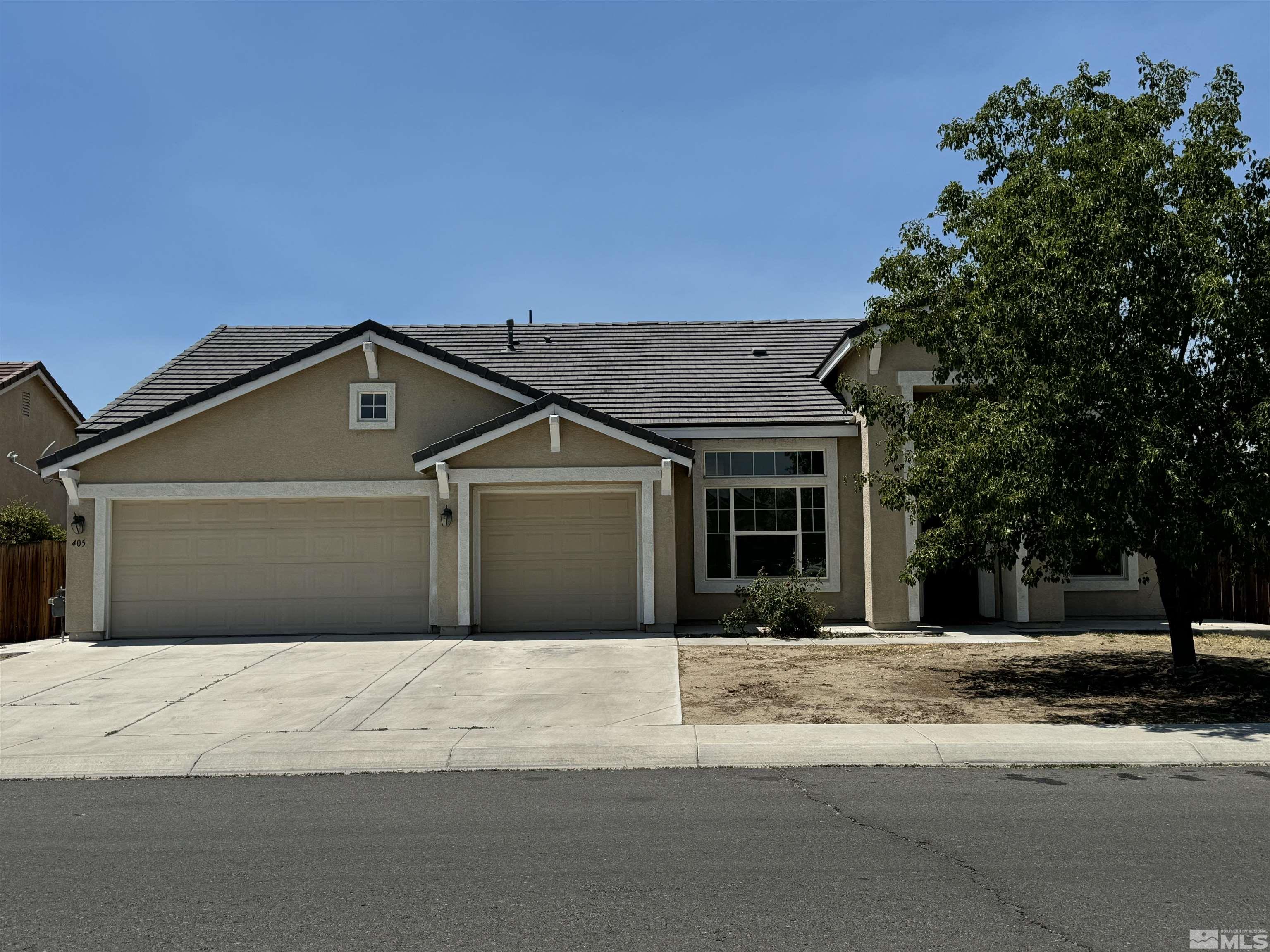 405 Sapphire Way Fallon, NV 89406 - Photo 30 of 30 a front view of a house with a yard
