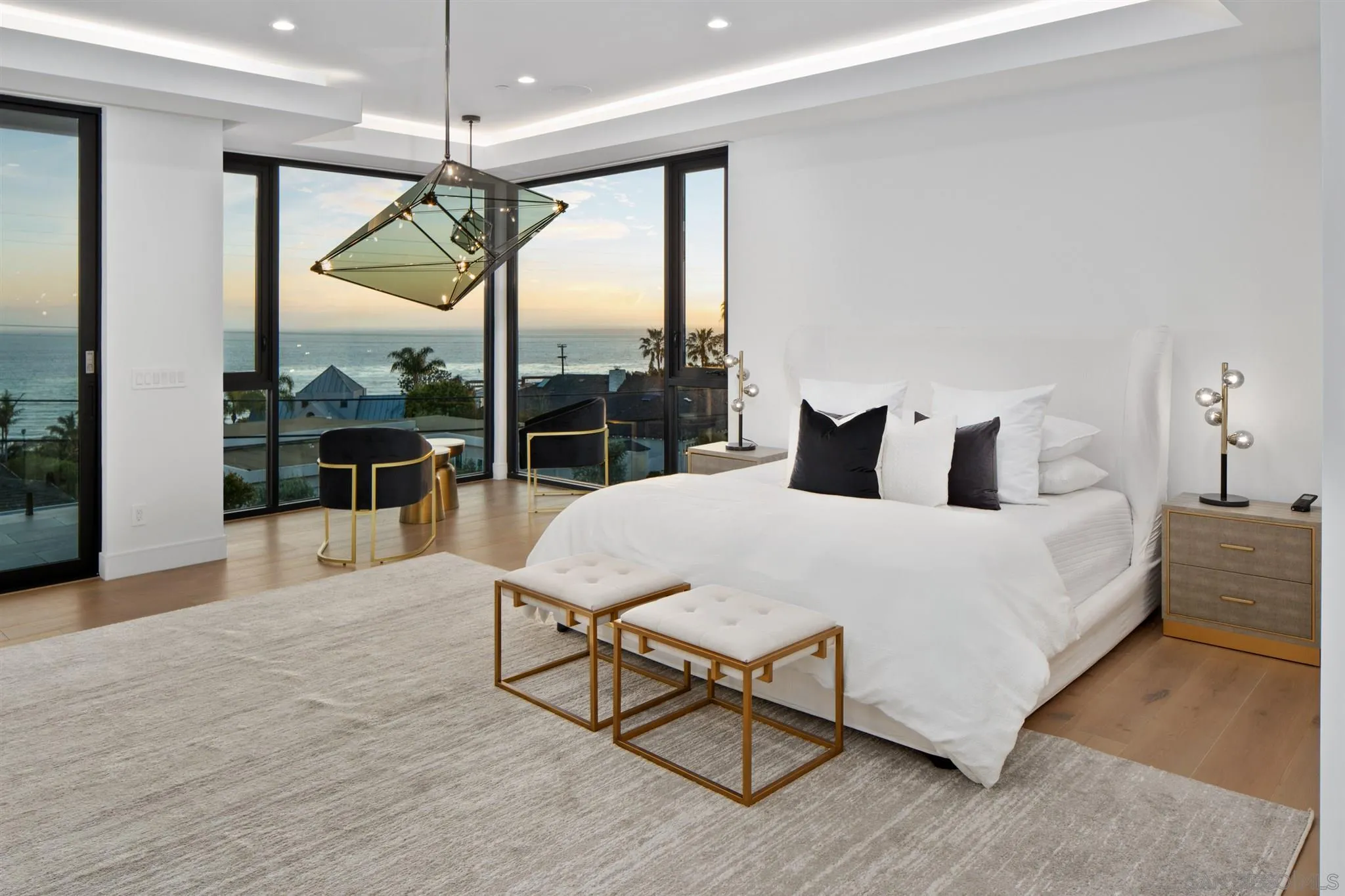 926 La Jolla Rancho Road La Jolla, CA 92037 - Photo 21 of 54 a bedroom with a bed and large window