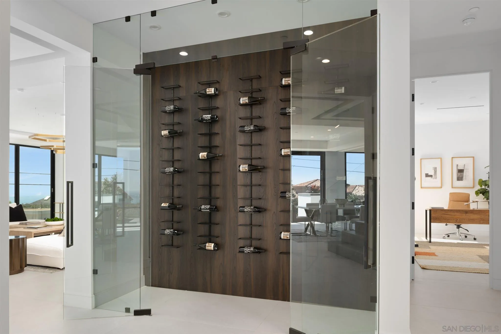926 La Jolla Rancho Road La Jolla, CA 92037 - Photo 25 of 54 a bathroom with a glass shower door