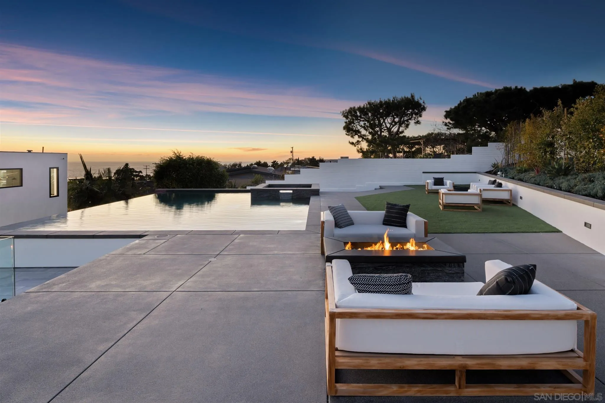 926 La Jolla Rancho Road La Jolla, CA 92037 - Photo 44 of 54 a terrace of a house with outdoor seating