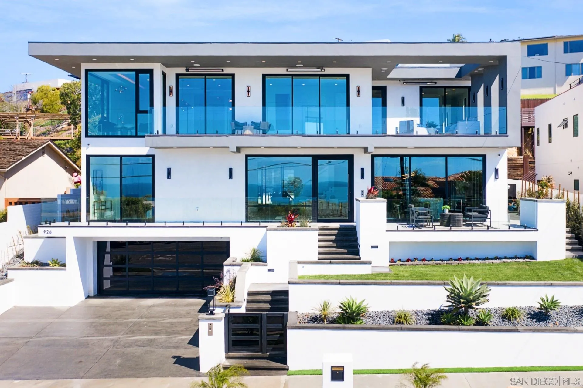926 La Jolla Rancho Road La Jolla, CA 92037 - Photo 5 of 54 a view of house with outdoor space and swimming pool