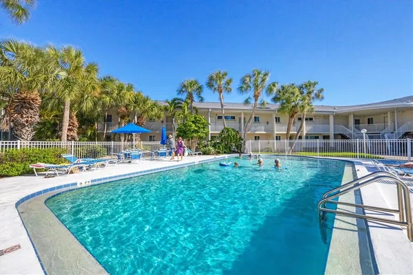 a view of swimming pool from a patio