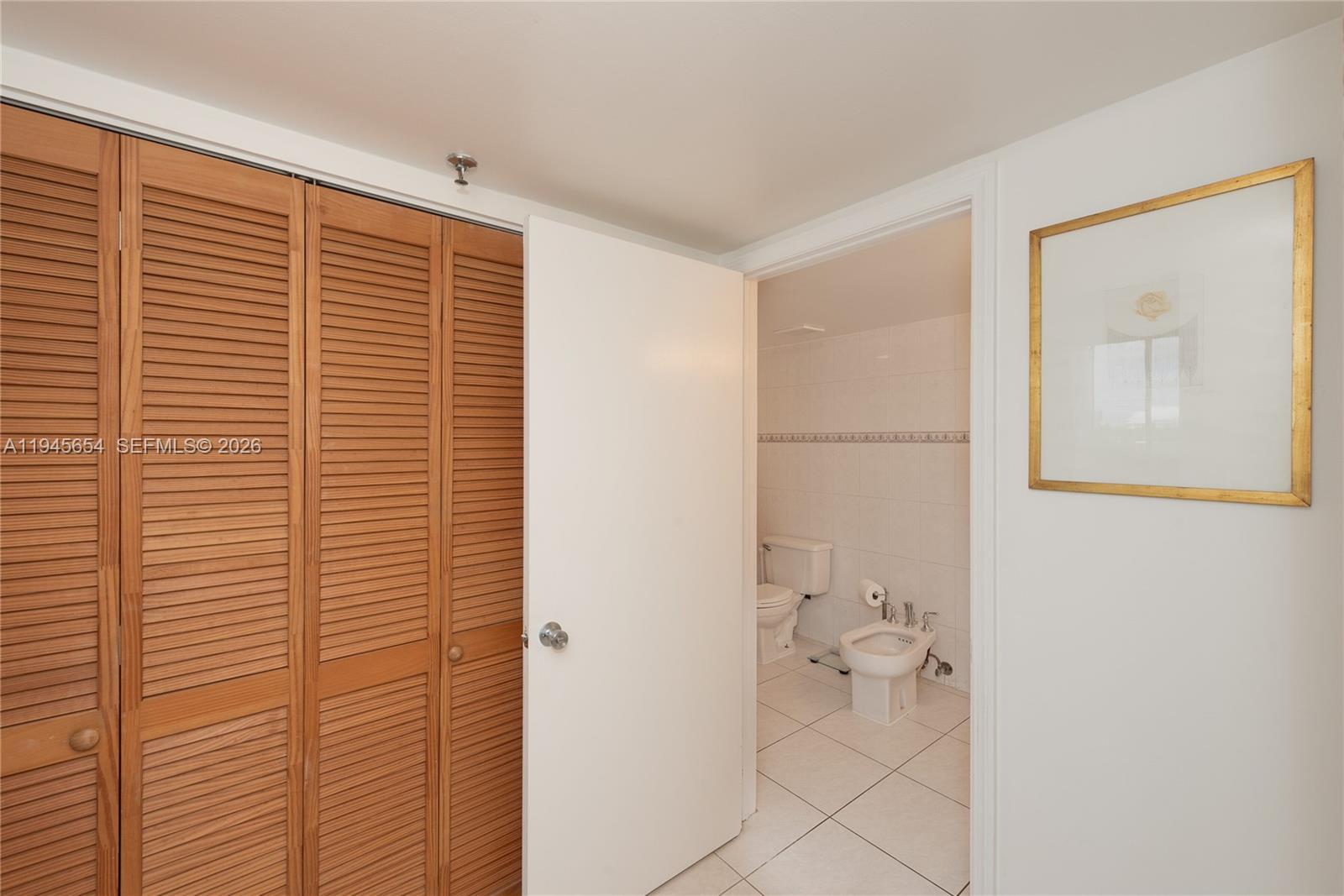 2400 Southwest 3rd Avenue, Unit 703 Miami, FL 33129 - Photo 22 of 29 a bathroom with a toilet