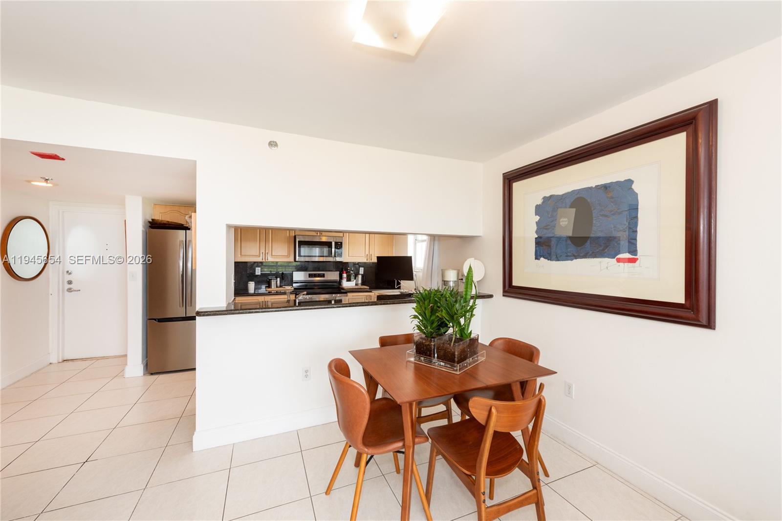 2400 Southwest 3rd Avenue, Unit 703 Miami, FL 33129 - Photo 10 of 29 a living room with furniture and a potted plant