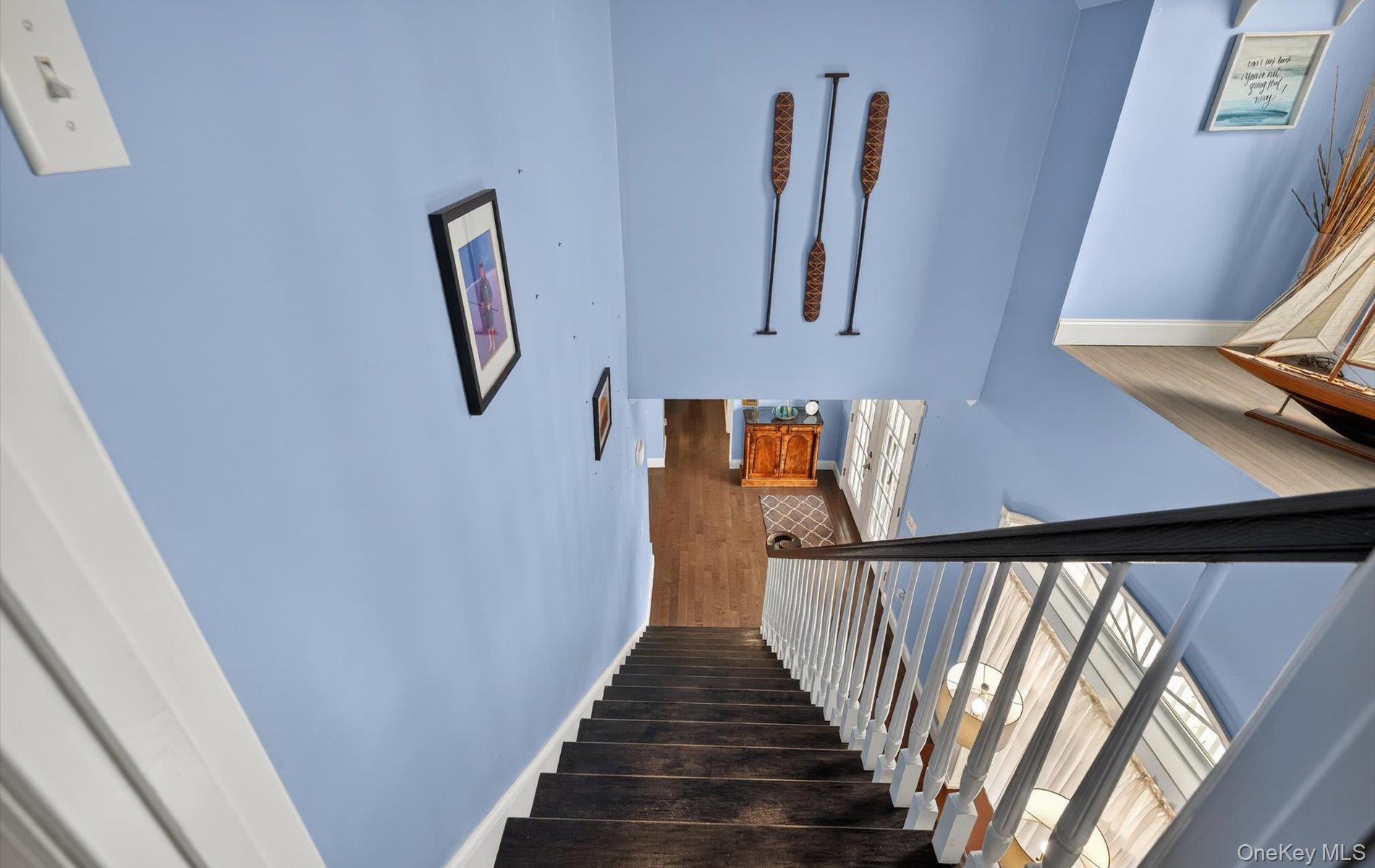 108 Awixa Avenue Bay Shore, NY 11706 - Photo 28 of 47 Staircase featuring baseboards and wood finished floors