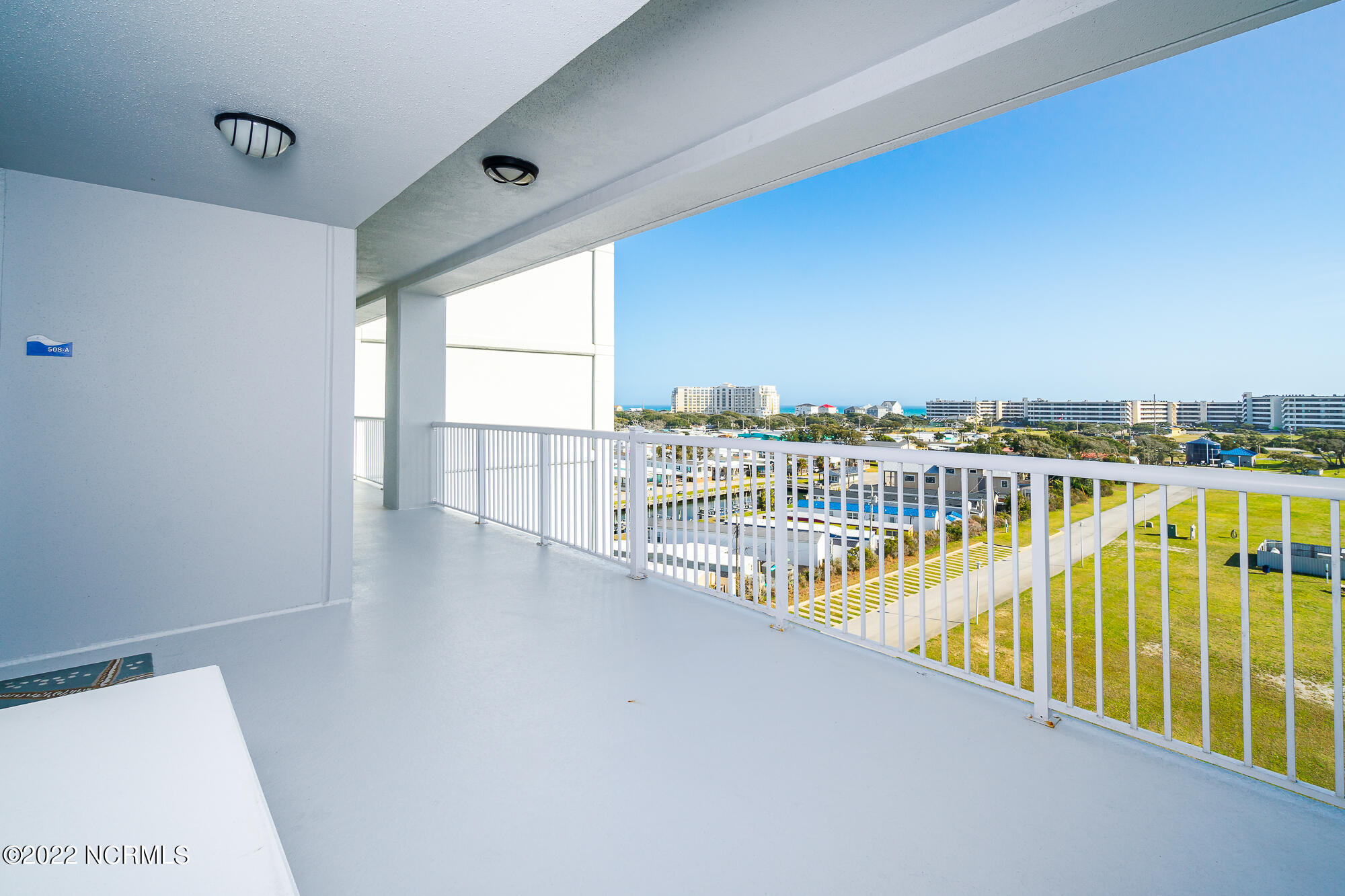 1550 Salter Path Road, Unit 508 Indian Beach, NC 28512 - Photo 29 of 46 Covered front porch