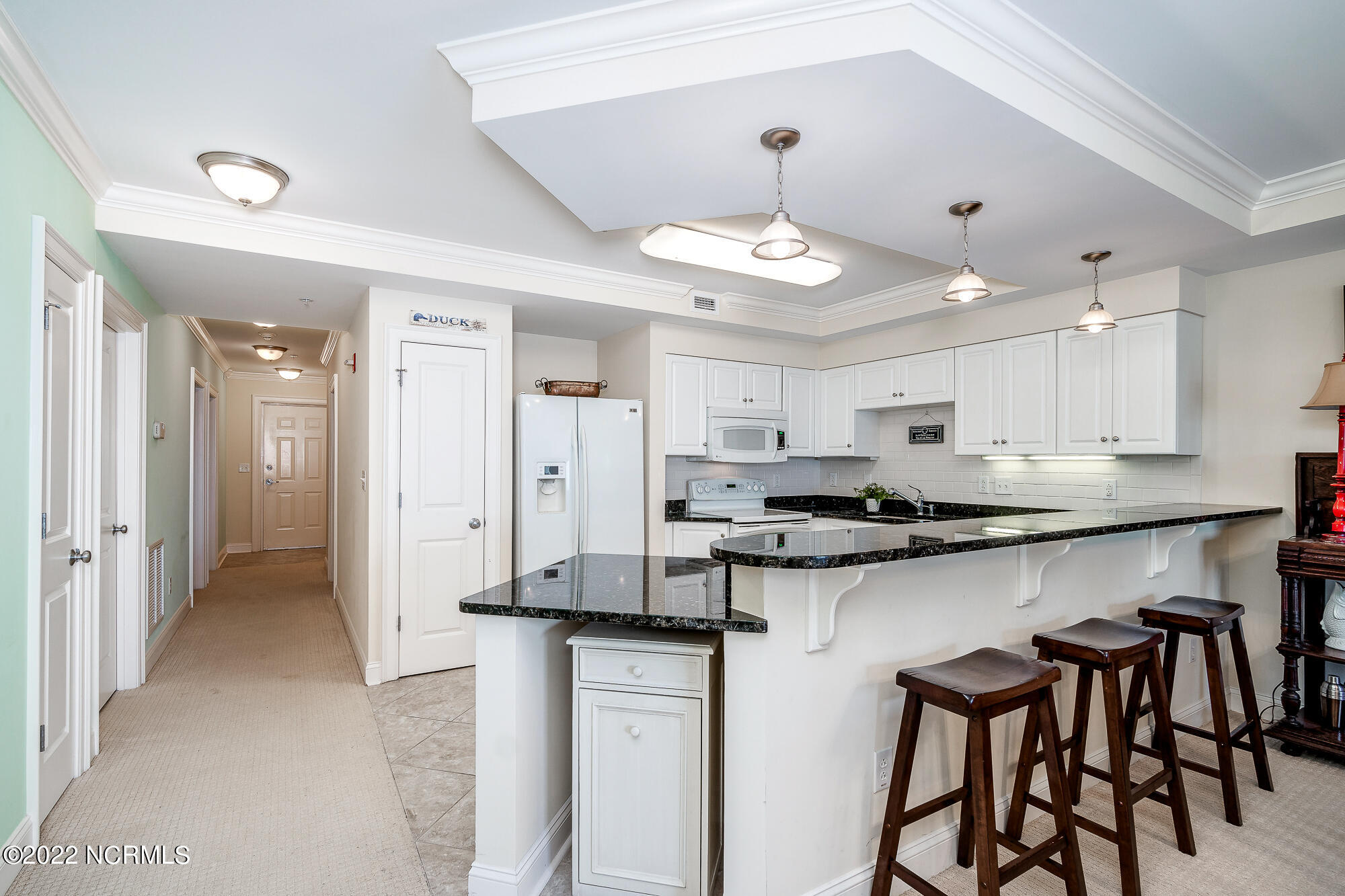 1550 Salter Path Road, Unit 508 Indian Beach, NC 28512 - Photo 4 of 46 Kitchen w/ peninsula seating