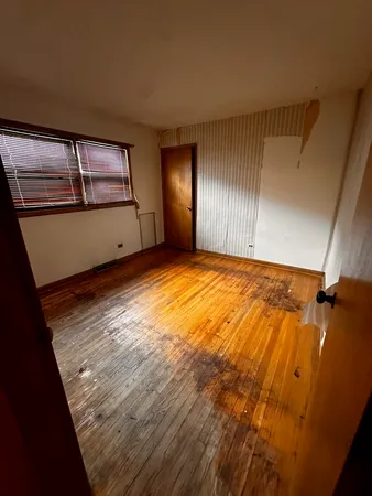 a bathroom with sink and mirror