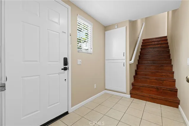 a view of entryway with stairs