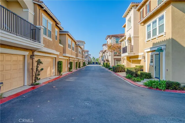 a city street lined with tall buildings