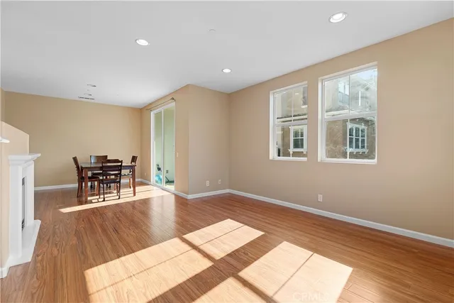 a view of a livingroom with furniture and wooden floor