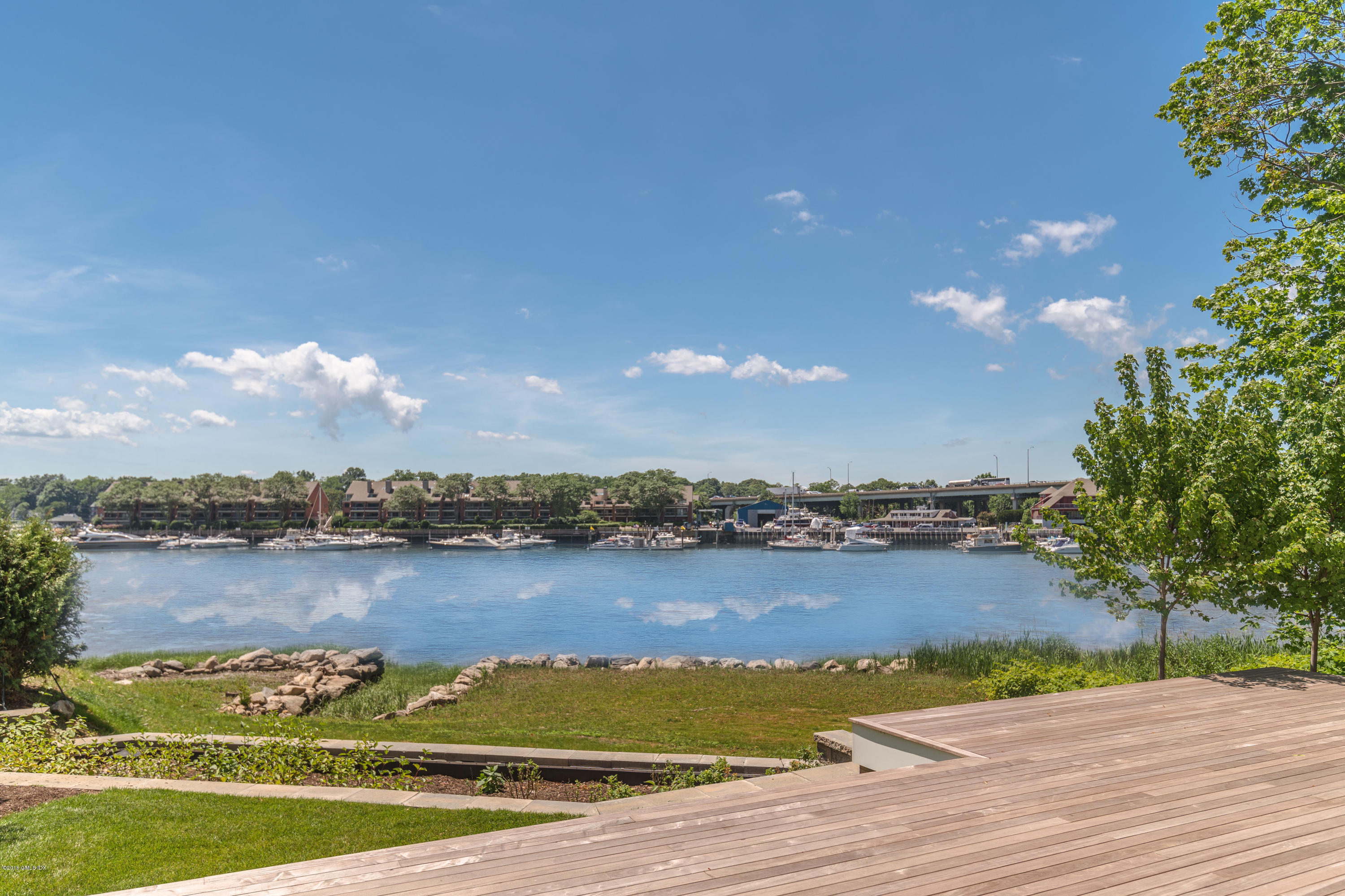 27 Bayside Terrace Riverside, CT 06878 - Photo 1 of 56 an aerial view of residential building with outdoor space and lake view