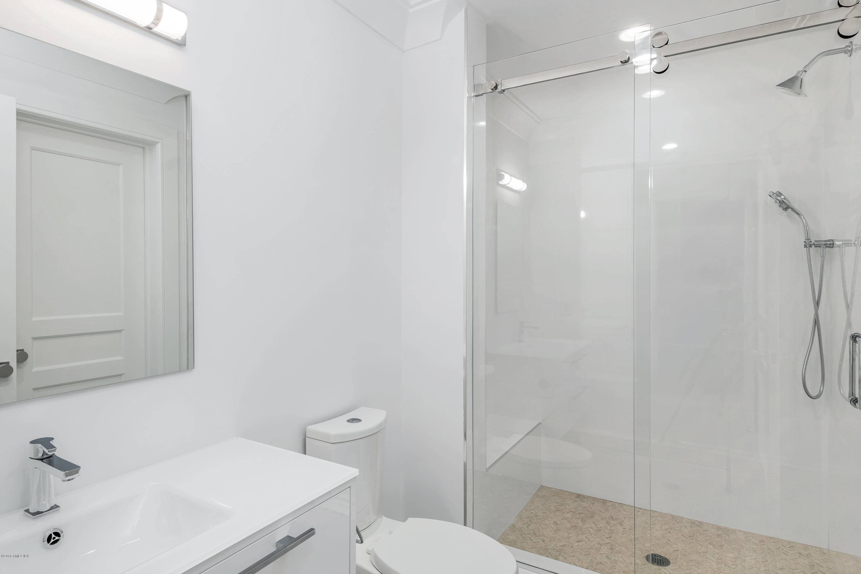 27 Bayside Terrace Riverside, CT 06878 - Photo 52 of 56 a bathroom with a sink toilet and shower