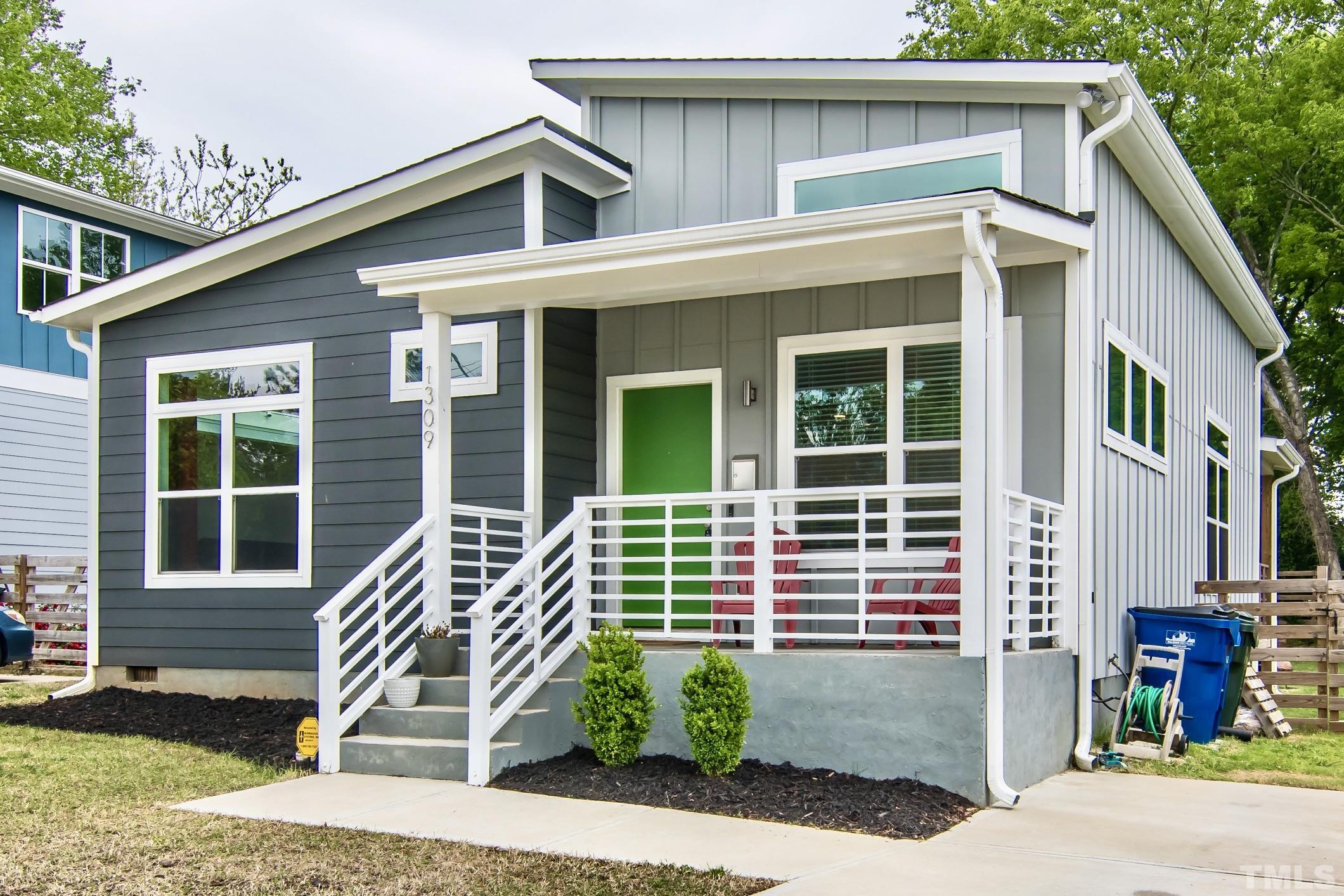 1309 South East Street Raleigh, NC 27601 - Photo 2 of 29 a front view of a house with garden
