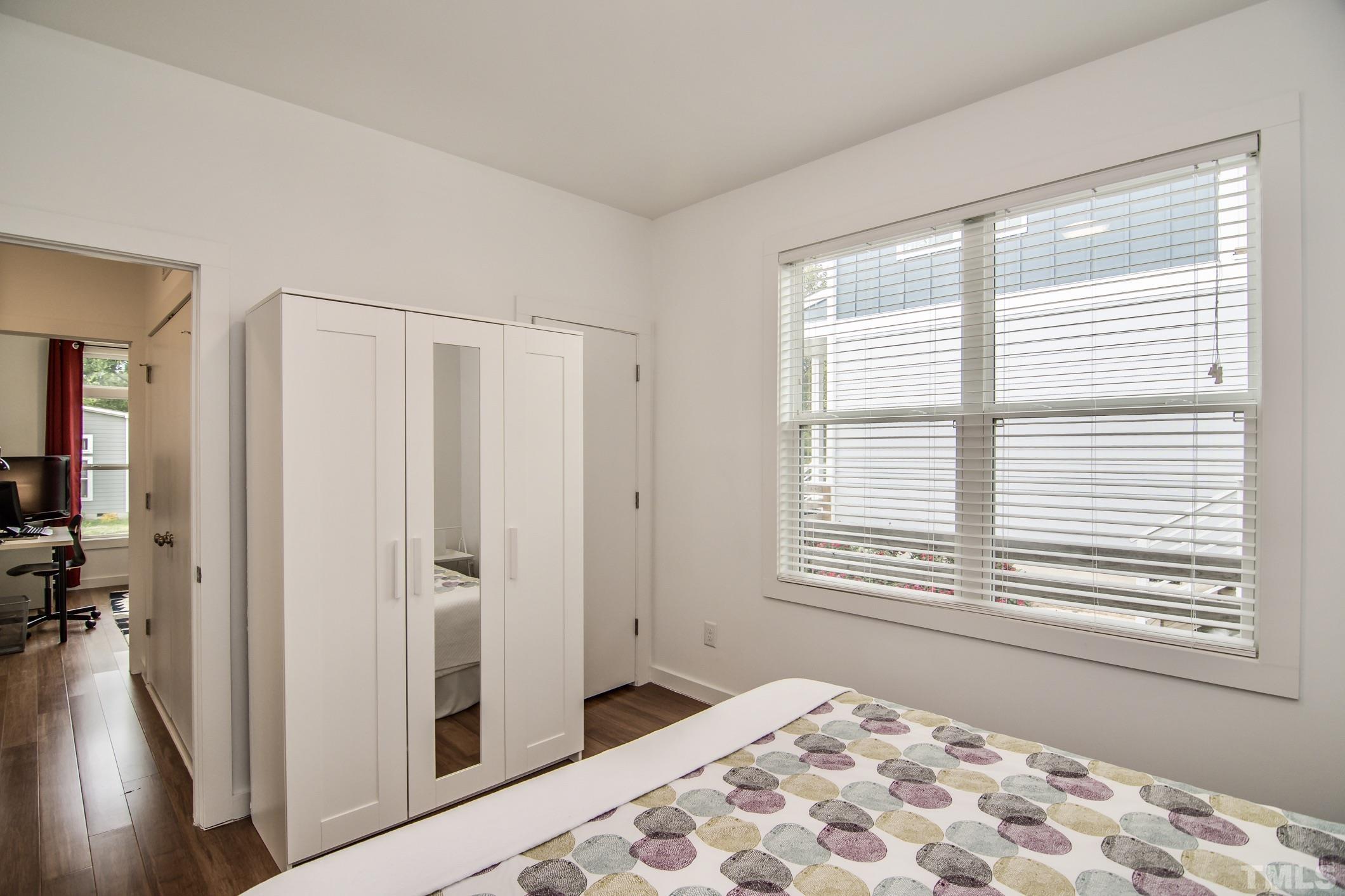 1309 South East Street Raleigh, NC 27601 - Photo 21 of 29 a bedroom with a bed and a window