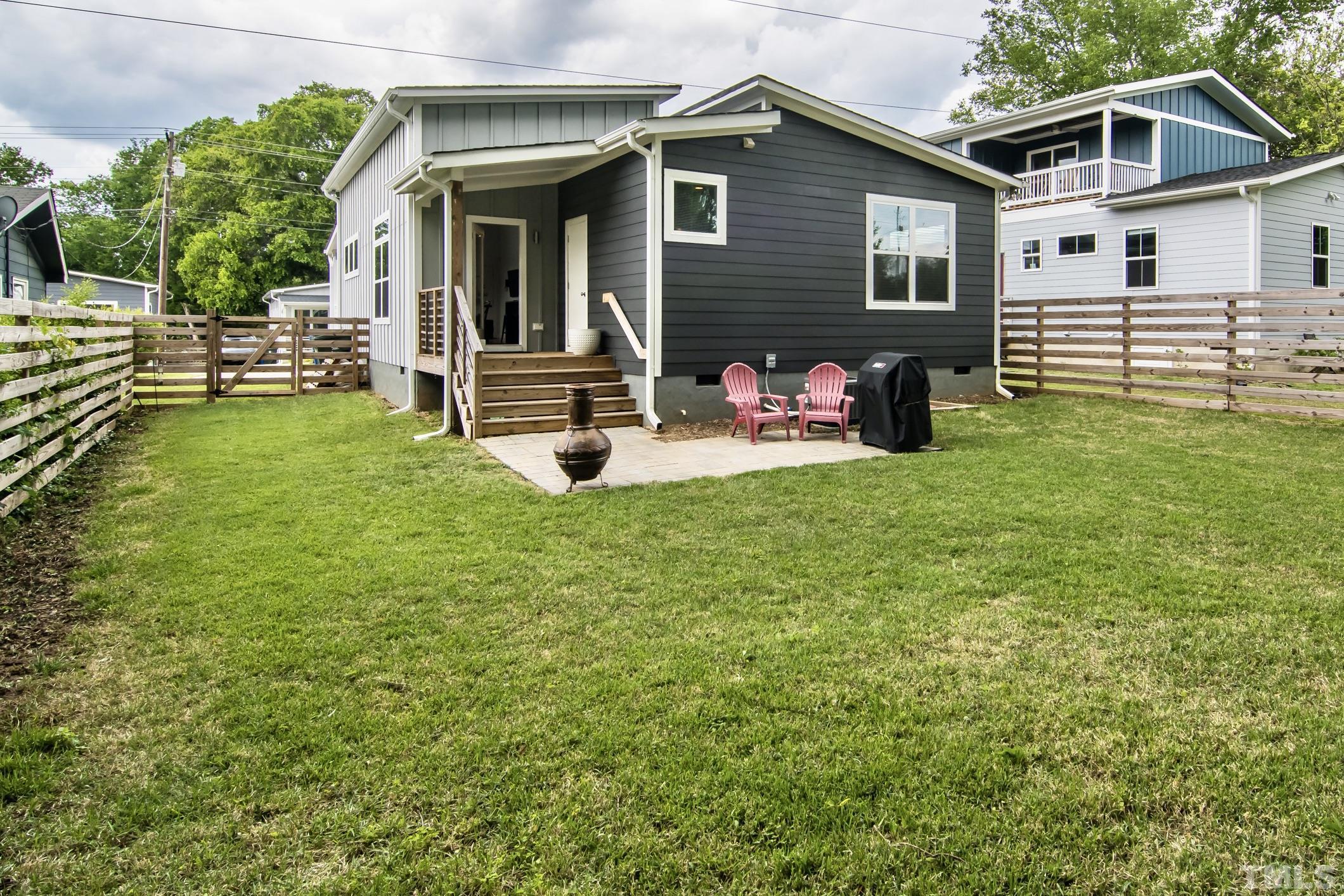 1309 South East Street Raleigh, NC 27601 - Photo 25 of 29 a front view of a house with garden