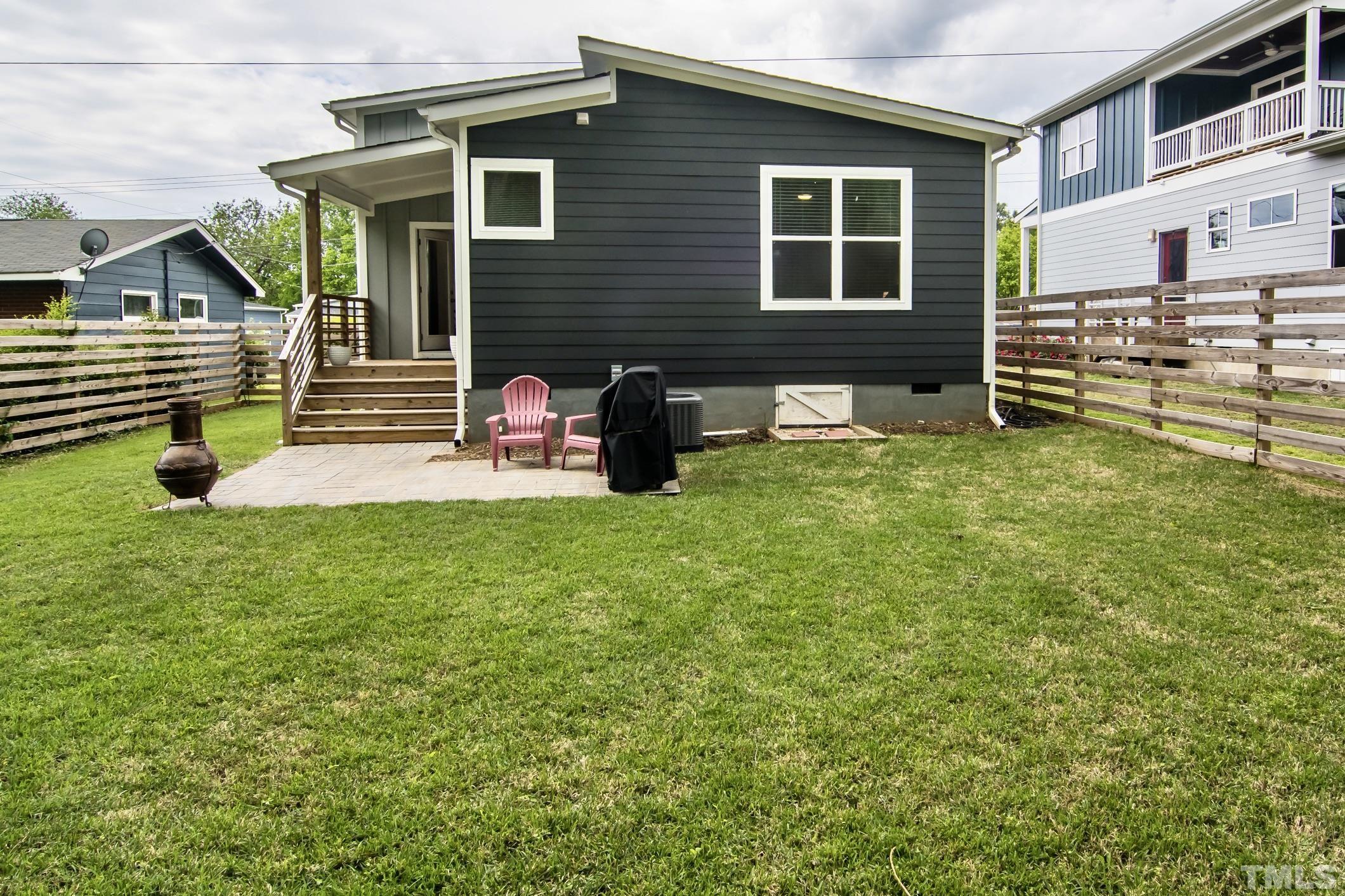 1309 South East Street Raleigh, NC 27601 - Photo 26 of 29 a view of house with backyard porch and furniture
